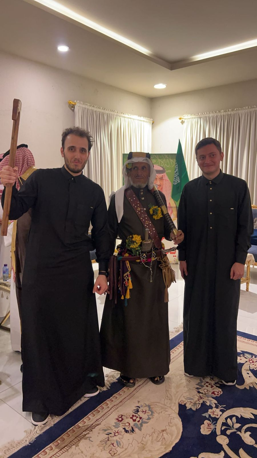 Guests with elder in traditional tribal attire